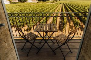 Balkón nebo terasa v ubytování Chambres d'hôte & Gîte Château Le Conte - Saint Emilion