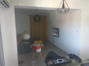 TV a/nebo společenská místnost v ubytování Apartment Belas
