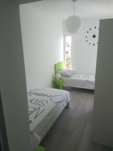 Postel nebo postele na pokoji v ubytování Apartment Belas