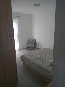 Postel nebo postele na pokoji v ubytování Apartment Belas