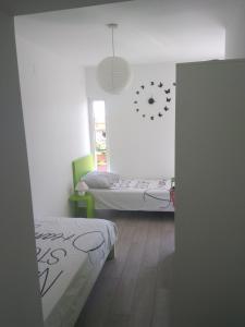 Postel nebo postele na pokoji v ubytování Apartment Belas