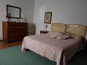 Posteľ alebo postele v izbe v ubytovaní Casarossa, la casa del cuore