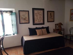 Posteľ alebo postele v izbe v ubytovaní Casarossa, la casa del cuore