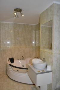 Koupelna v ubytování Hotel Condor