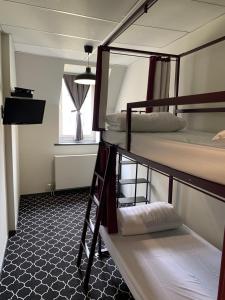 Postelja oz. postelje v sobi nastanitve Safestay Brussels Grand Place