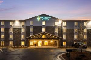 a rendering of the front of a hotel at WoodSpring Suites Atlanta Newnan in Newnan