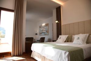 Postel nebo postele na pokoji v ubytování Jardines de la Mata Boutique Beach + 37 fotografií
