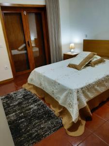 Katil atau katil-katil dalam bilik di Casa do Tio Quim
