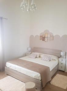 Voodi või voodid majutusasutuse La Casa Delle Rose 2 toas