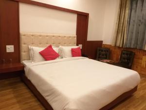 Hotel Bali Resort extension客房内的一张或多张床位