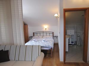 Postel nebo postele na pokoji v ubytování Holiday Home Sumartin (626-1)