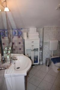 Koupelna v ubytování Holiday Home Sumartin (626-1)