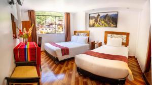 Voodi või voodid majutusasutuse Hotel Machupicchu Inn toas