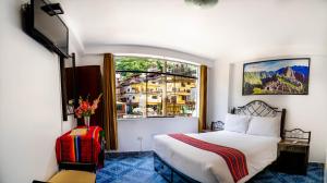Voodi või voodid majutusasutuse Hotel Machupicchu Inn toas