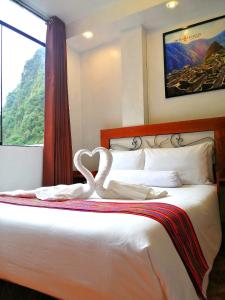 Voodi või voodid majutusasutuse Hotel Machupicchu Inn toas