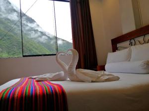 Voodi või voodid majutusasutuse Hotel Machupicchu Inn toas