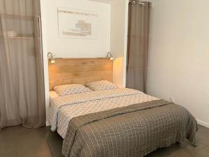 מיטה או מיטות בחדר ב-Home 33