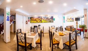 Restoran või mõni muu söögikoht majutusasutuses Hotel Machupicchu Inn