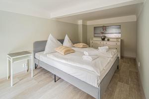 Postel nebo postele na pokoji v ubytování Sightseeing apartment by Ruterra