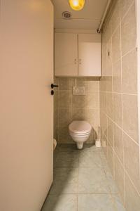 Koupelna v ubytování Sightseeing apartment by Ruterra