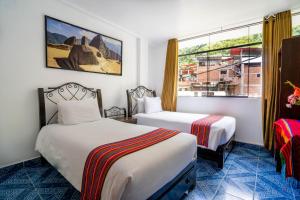 Voodi või voodid majutusasutuse Hotel Machupicchu Inn toas