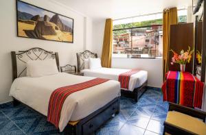 Voodi või voodid majutusasutuse Hotel Machupicchu Inn toas