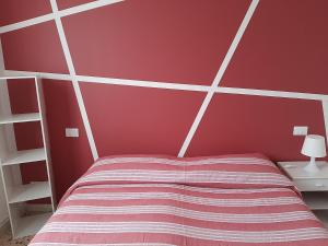 Postel nebo postele na pokoji v ubytování Gardenia Guest House