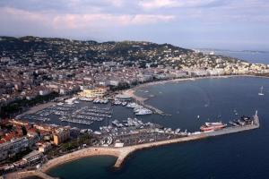 an aerial view of a harbor with boats in the water at Hotel Splendid in Cannes
