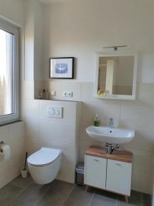 Ένα μπάνιο στο Ferienapartment Vögelsen +19 φωτογραφίες
