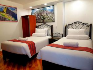 Voodi või voodid majutusasutuse Hotel Machupicchu Inn toas