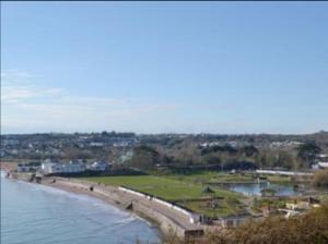 a view of a beach and the water at High gables Apartment 1 in Paignton