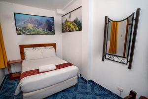 Voodi või voodid majutusasutuse Hotel Machupicchu Inn toas