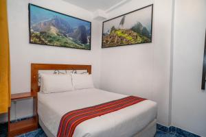 Voodi või voodid majutusasutuse Hotel Machupicchu Inn toas