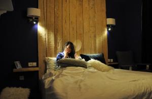 A bed or beds in a room at Dar Elrio