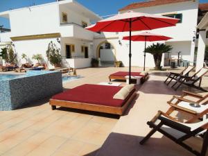 Bazén v ubytování Oasis Beach Club nebo v jeho okolí