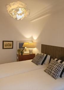 Ένα ή περισσότερα κρεβάτια σε δωμάτιο στο NEW! Beautiful City Apartment Santander