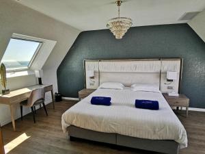 Le Diana Hôtel & Spa客房内的一张或多张床位