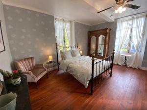 Ένα ή περισσότερα κρεβάτια σε δωμάτιο στο Maison de Haouret