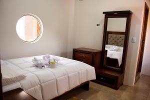 Postel nebo postele na pokoji v ubytování Hotel Imperial Zumbahua & Quilotoa Lodge