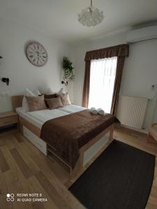 Posteľ alebo postele v izbe v ubytovaní AnitApartman