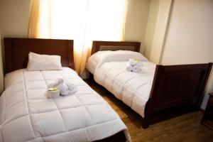 Postel nebo postele na pokoji v ubytování Hotel Imperial Zumbahua & Quilotoa Lodge