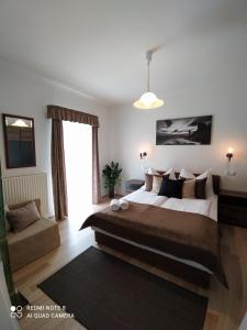 Posteľ alebo postele v izbe v ubytovaní AnitApartman