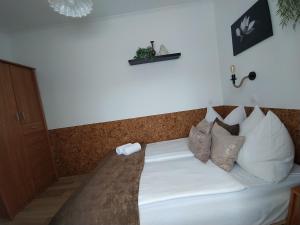 Posteľ alebo postele v izbe v ubytovaní AnitApartman