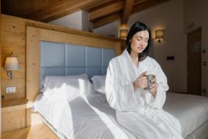 Postel nebo postele na pokoji v ubytování Hotel Chalet Del Brenta