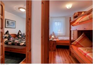 Apartament w Villa Konik Mazury tesisinde bir ranza yatağı veya ranza yatakları