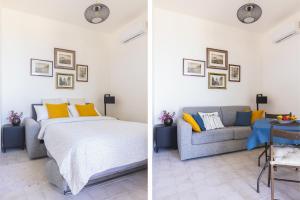 ein Schlafzimmer mit einem Bett und einem Sofa in der Unterkunft Casa Villea in Trabia