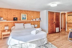 Postel nebo postele na pokoji v ubytování Le Chalet des Neiges - Welkeys + 5 fotografií