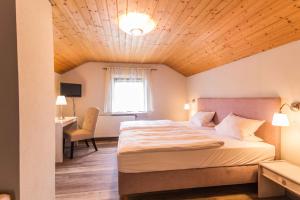 Postel nebo postele na pokoji v ubytování Hotel Braun