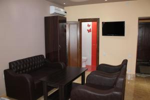 TV a/nebo společenská místnost v ubytování Princ Plaza Hotel