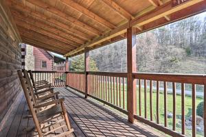 A balcony or terrace at Smoky Mountain Cabin with Game Room and Hot Tub!